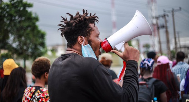 Peter Eromosele Adene during the #EndSARS protests.